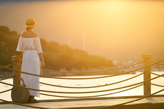 woman watching a sunset.