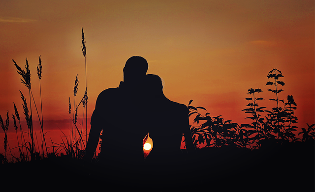 couple watching the sunset,