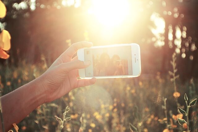 Taking a selfie with your significant other.