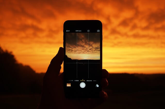 Taking a picture of the sky.