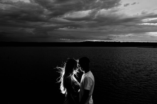 kissing in a storm.