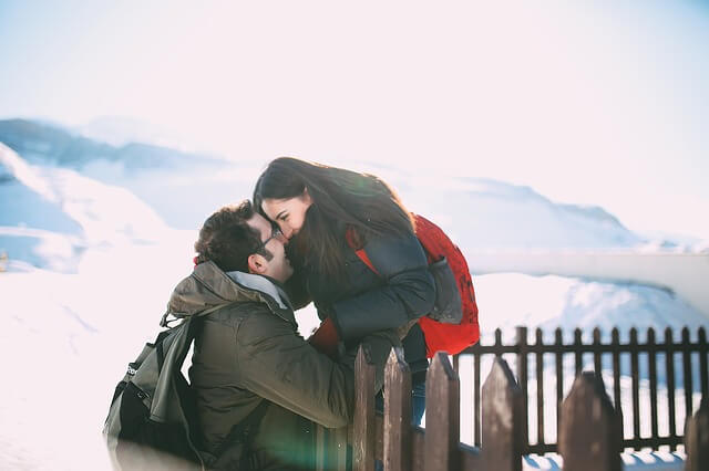 couple making intense eye contact.