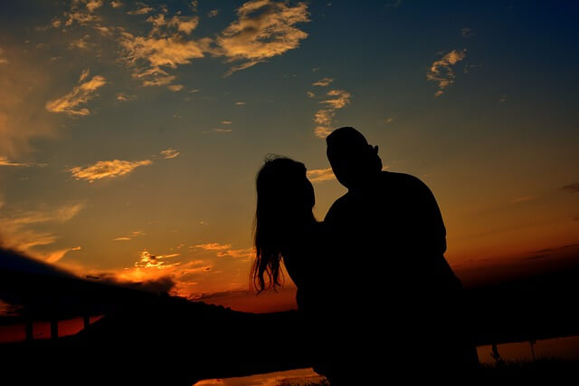 lovers gazing a sunset