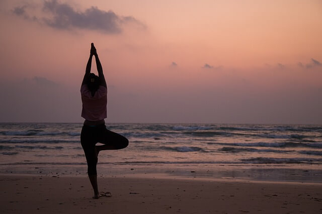 confident woman doing yoga